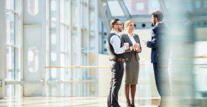 business colleagues speaking with manager