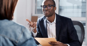 Male boss speaking to prospect employee